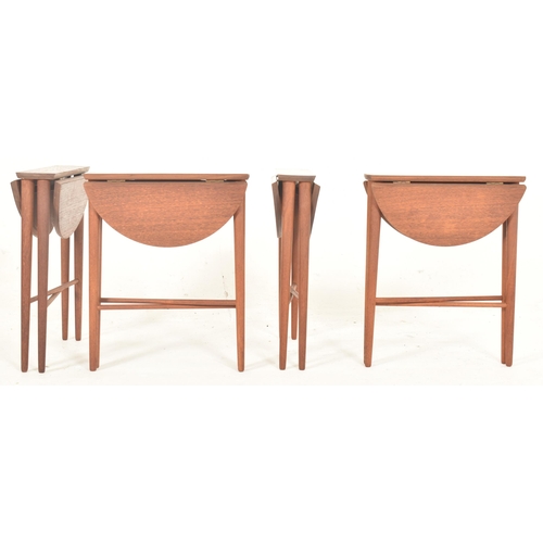 477 - Poul Hundevad, Denmark - A retro mid 20th century circa 1960s Danish drop leaf teak veneered quartet... 