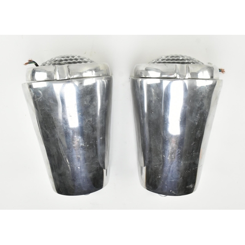 478 - A pair of retro 20th century polished aluminium industrial wall lights / sconces. Each having a tape... 