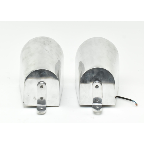 478 - A pair of retro 20th century polished aluminium industrial wall lights / sconces. Each having a tape... 