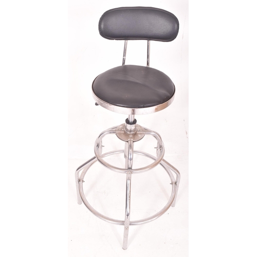 482 - A vintage mid century circa 1970s chrome & leatherette barbers chair. The stool high & with ... 