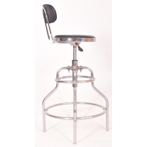 482 - A vintage mid century circa 1970s chrome & leatherette barbers chair. The stool high & with ... 