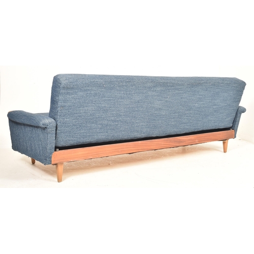 485 - A retro 20th century Danish daybed / sofa settee. The sofa having buttoned back backrest with uphols... 