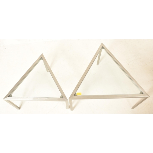 489 - A retro 20th century Italian manner glass & chrome nest of two triangular tables. Each having a ... 