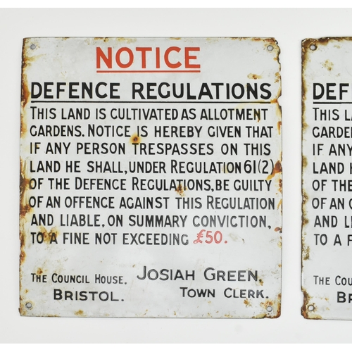 490 - A pair of early 20th century circa 1930s Bristol porcelain enamel signs. Each sign reading Defence R... 