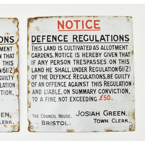 490 - A pair of early 20th century circa 1930s Bristol porcelain enamel signs. Each sign reading Defence R... 