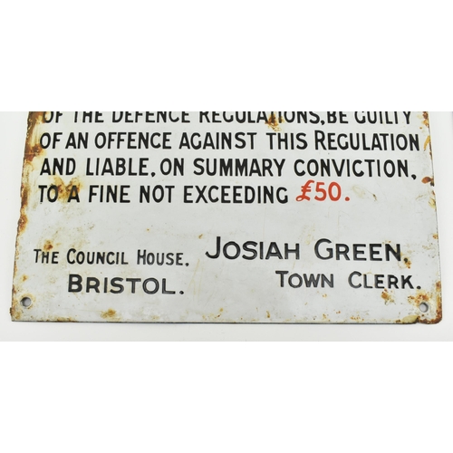 490 - A pair of early 20th century circa 1930s Bristol porcelain enamel signs. Each sign reading Defence R... 