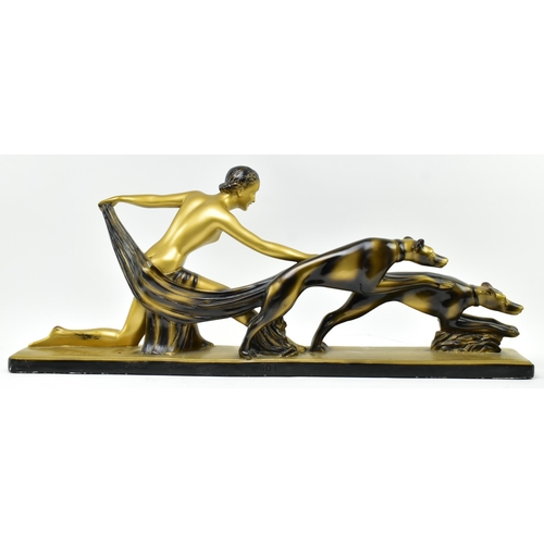 5 - S. Melani - a 20th century Art Deco plaster worked sculpture figural group. The sculpture showing a ... 