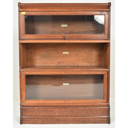 520 - Globe Wernicke - An early 20th century oak wood Globe Wernicke lawyers barristers stacking bookcase.... 