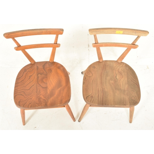 524 - A set a four retro mid 20th century circa 1960s oak wood children's fan back school chairs. Ecach ch... 