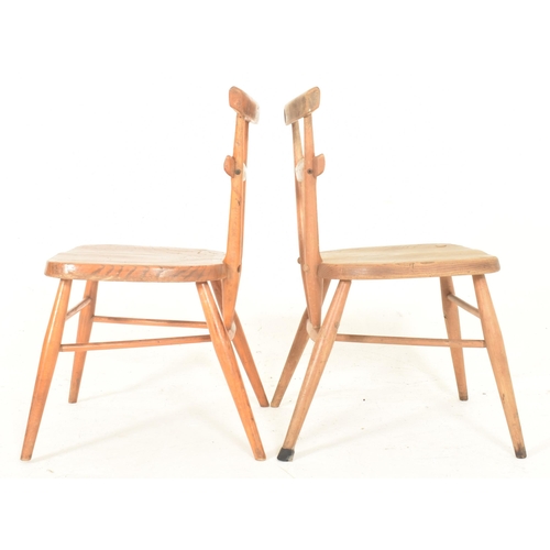 524 - A set a four retro mid 20th century circa 1960s oak wood children's fan back school chairs. Ecach ch... 