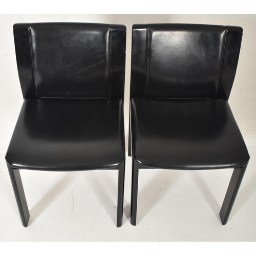 542 - A set of six vintage Italian high end designer leather covered dining chairs in black colourway, in ... 