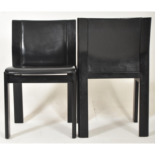 542 - A set of six vintage Italian high end designer leather covered dining chairs in black colourway, in ... 