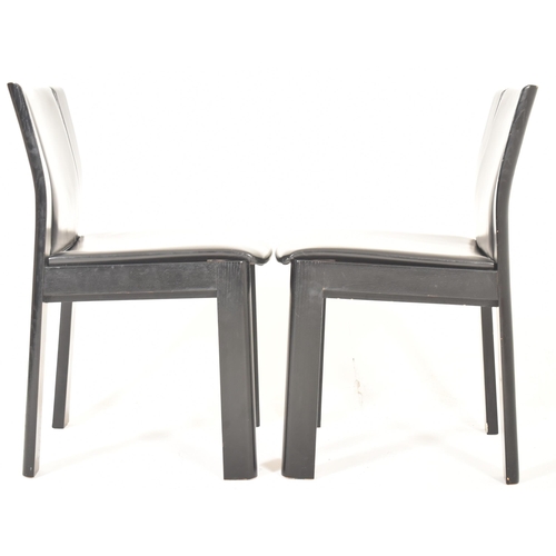 542 - A set of six vintage Italian high end designer leather covered dining chairs in black colourway, in ... 