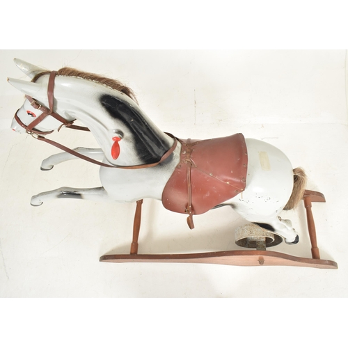 549 - Ragamuffin Toys Ltd. of Guernsey - a vintage 20th century grey painted rocking horse. The horse in a... 