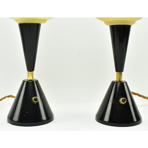 554 - A near matched pair of vintage 20th century Art Deco inspired colour glass & black metal desk ta... 