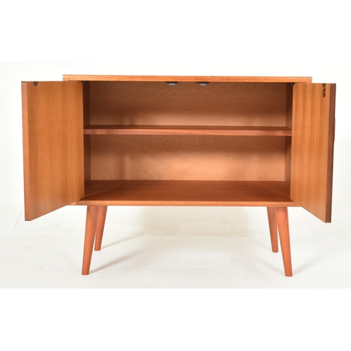 82 - G-Plan Furniture - Fresco Range - a retro mid 20th century teak wood twin door cupboard on legs. The... 