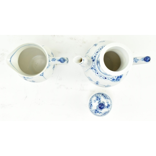 86 - A 1960s Royal Copenhagen porcelain blue fluted pattern part tea service. The lot comprising a hot wa... 