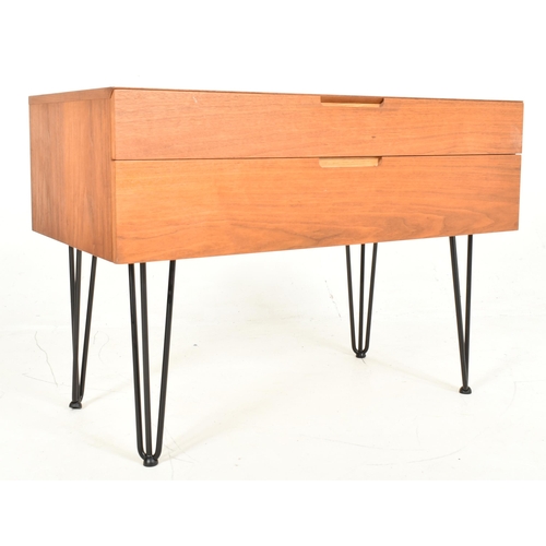 88 - A retro 20th century teak wood two drawers chest of drawers / side cabinet table. The chest having a... 