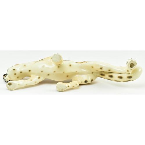 96 - A vintage 20th century hand painted fine bone china figure of leopard. The cat in walking position w... 