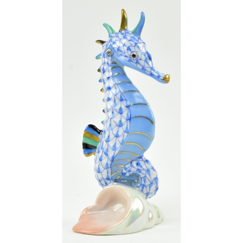 98 - Herend of Hungary - an early 2000s Hungarian porcelain figure of a seahorse. Finished in blue with g... 