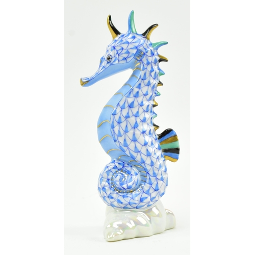 98 - Herend of Hungary - an early 2000s Hungarian porcelain figure of a seahorse. Finished in blue with g... 