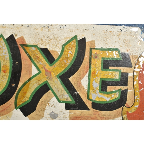 135 - De. Luxe - a large 20th century fairground / funfair hand painted sign, originally by Fred Fowle. Th... 