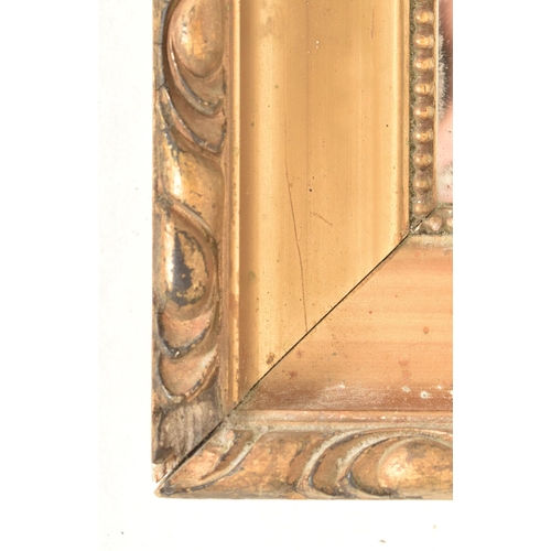 286 - An early 20th century gilt wood framed hanging mirror. The mirror of rectangular form with a gadroon... 