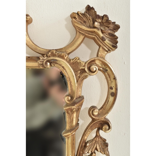 292 - Veronese product - a vintage 20th century burnished gilt effect Rococo style wall mirror. The mirror... 