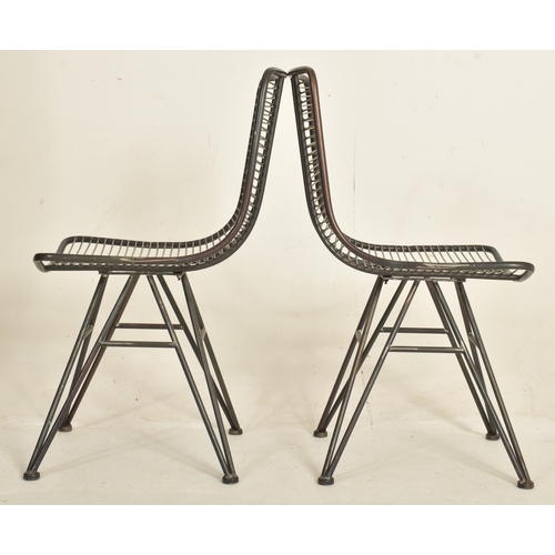 327 - A set of four modern designer metal and wire worked dining chairs / cafe chairs. Each having tubular... 