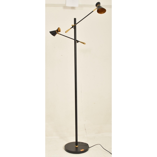 577 - Searchlight - a modern British designer floor standing lamp light. The lamp in the manner of Stilnov... 