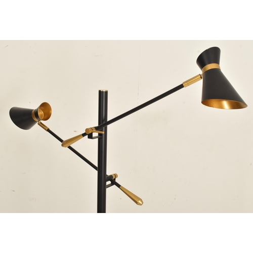 577 - Searchlight - a modern British designer floor standing lamp light. The lamp in the manner of Stilnov... 