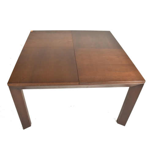 602 - Prestige Furniture - a contemporary French High-end designer solid oak extending dining table. The t... 