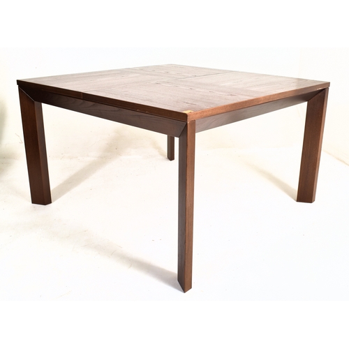 602 - Prestige Furniture - a contemporary French High-end designer solid oak extending dining table. The t... 