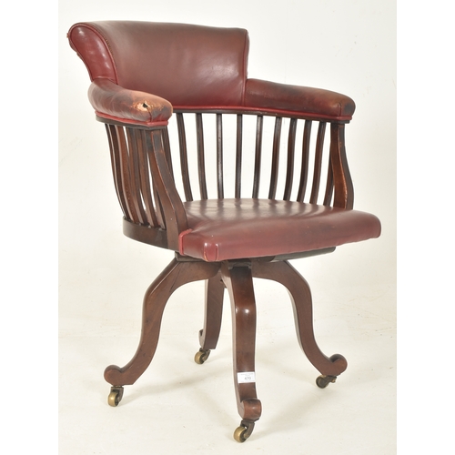 374 - A Victorian 19th century mahogany & leather spindle back captain's swivel chair. The chair havin... 