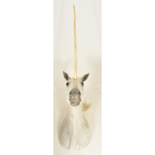 217 - Of natural history / taxidermy interest - a large white horse / unicorn head. The horse with white m... 