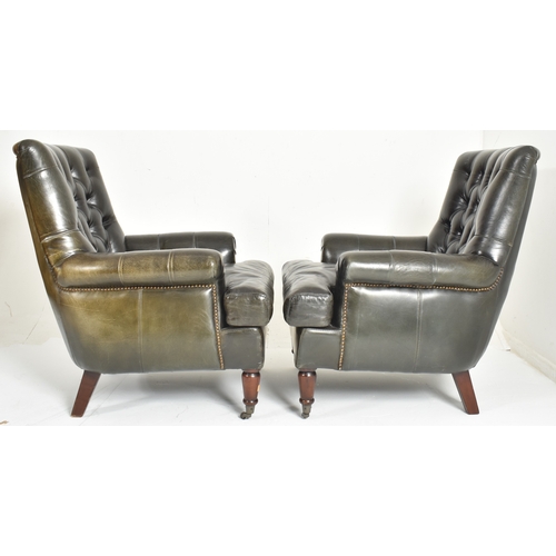 226 - A pair of bespoke made dark green leather buttoned back lounge armchairs. each chair having a button... 