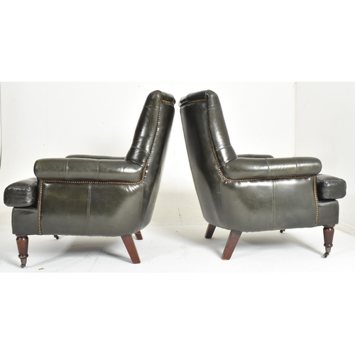 226 - A pair of bespoke made dark green leather buttoned back lounge armchairs. each chair having a button... 