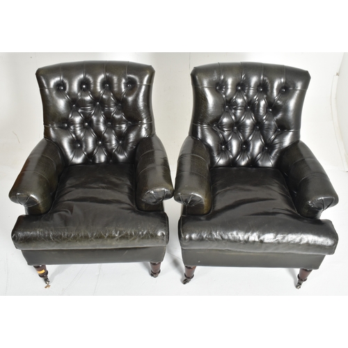 226 - A pair of bespoke made dark green leather buttoned back lounge armchairs. each chair having a button... 