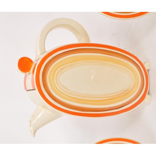 1 - Clarice Cliff - Bizarre - A collection of mid century ceramic part tea service pieces, in the orange... 