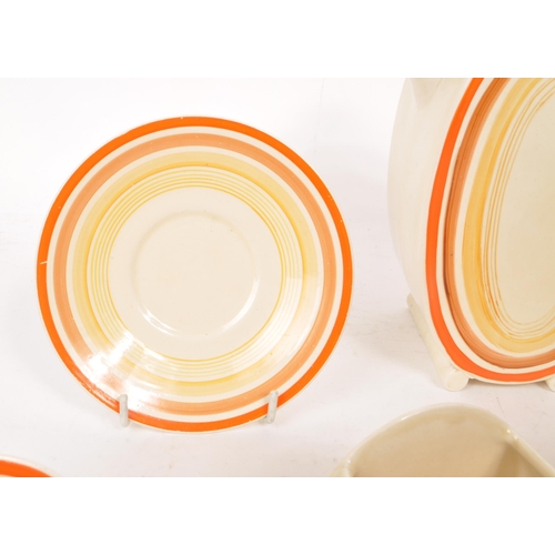 1 - Clarice Cliff - Bizarre - A collection of mid century ceramic part tea service pieces, in the orange... 