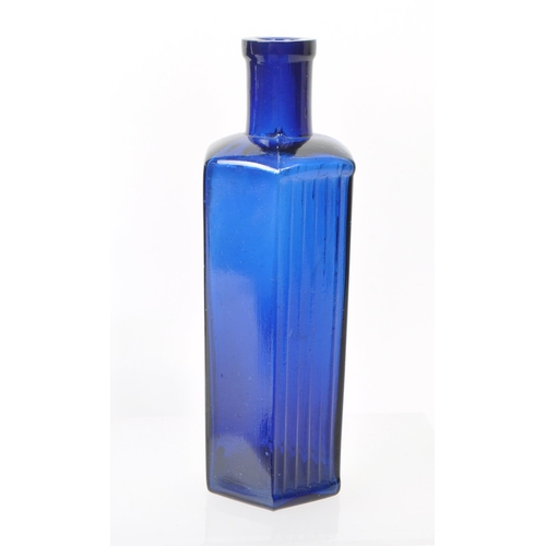 101 - A collection of 20th century Bristol blue studio art glass. The collection to include jugs, vases, b... 