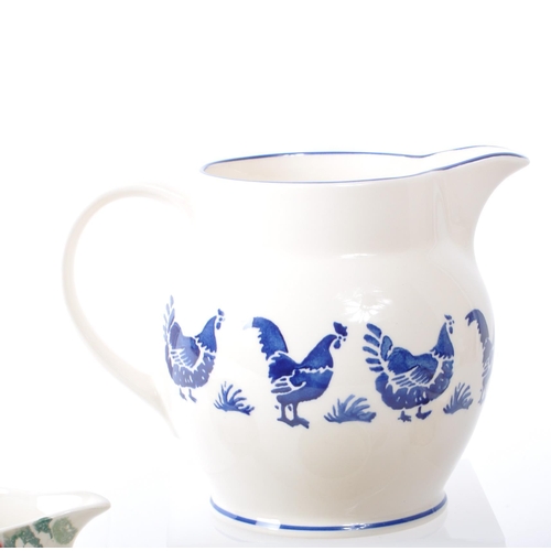 103 - Emma Bridgewater, Stoke on Trent - A collection of ceramic mugs and jugs. To include Gymkhana race h... 