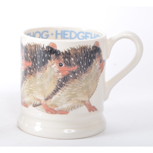 103 - Emma Bridgewater, Stoke on Trent - A collection of ceramic mugs and jugs. To include Gymkhana race h... 