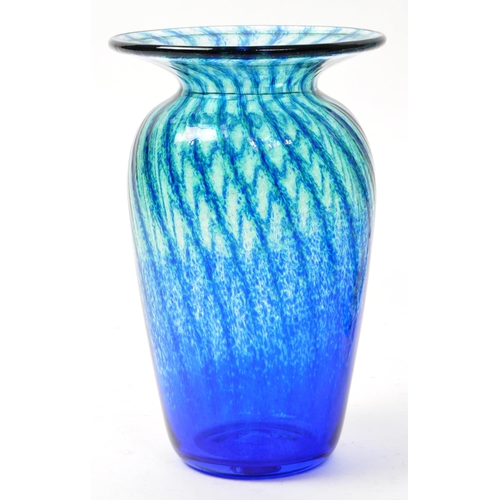 104 - Caithness - A modern dolphin glass vase having a streak of blue depicting water / waves. Together wi... 