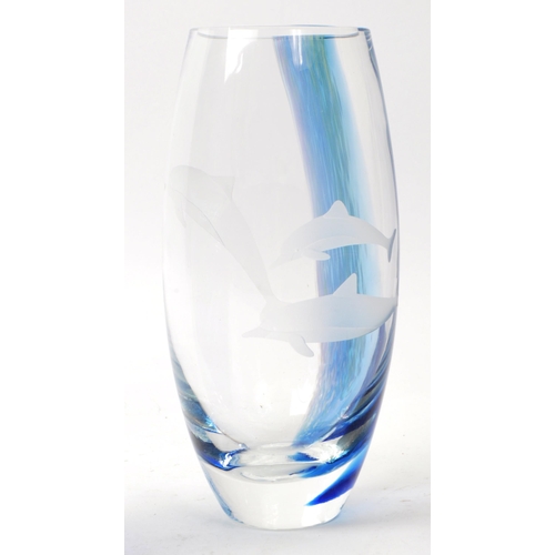 104 - Caithness - A modern dolphin glass vase having a streak of blue depicting water / waves. Together wi... 