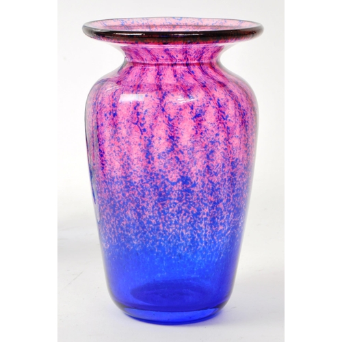 104 - Caithness - A modern dolphin glass vase having a streak of blue depicting water / waves. Together wi... 