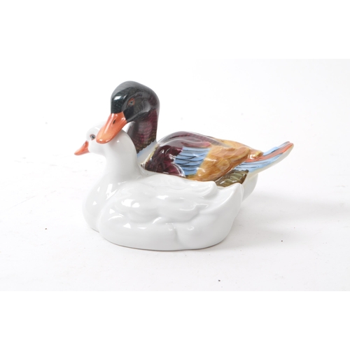 106 - Herend - A vintage 20th century Herend model 5036 porcelain duck figures. Each figure in the form of... 