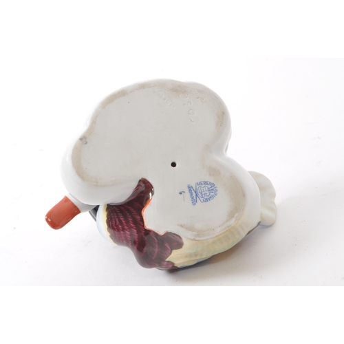 106 - Herend - A vintage 20th century Herend model 5036 porcelain duck figures. Each figure in the form of... 