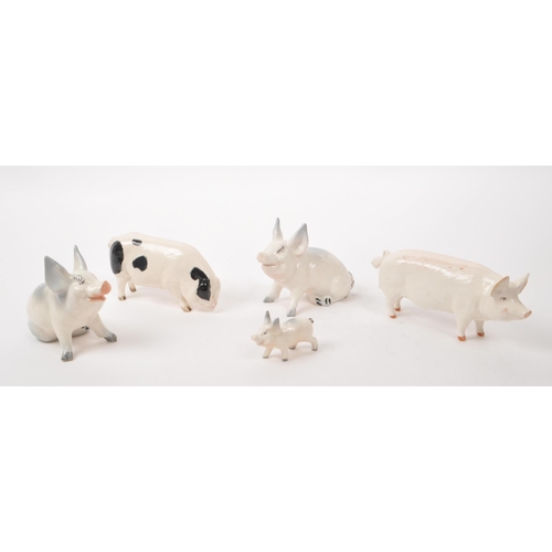 11 - Beswick - A collection of five 20th century porcelain pig figurines, comprising of, 'CH Wall CH Boy ... 