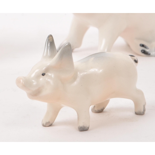 11 - Beswick - A collection of five 20th century porcelain pig figurines, comprising of, 'CH Wall CH Boy ... 